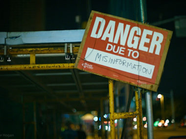 Sign that reads: Danger Due to Misinformation. Photo courtesy of 3dpete.